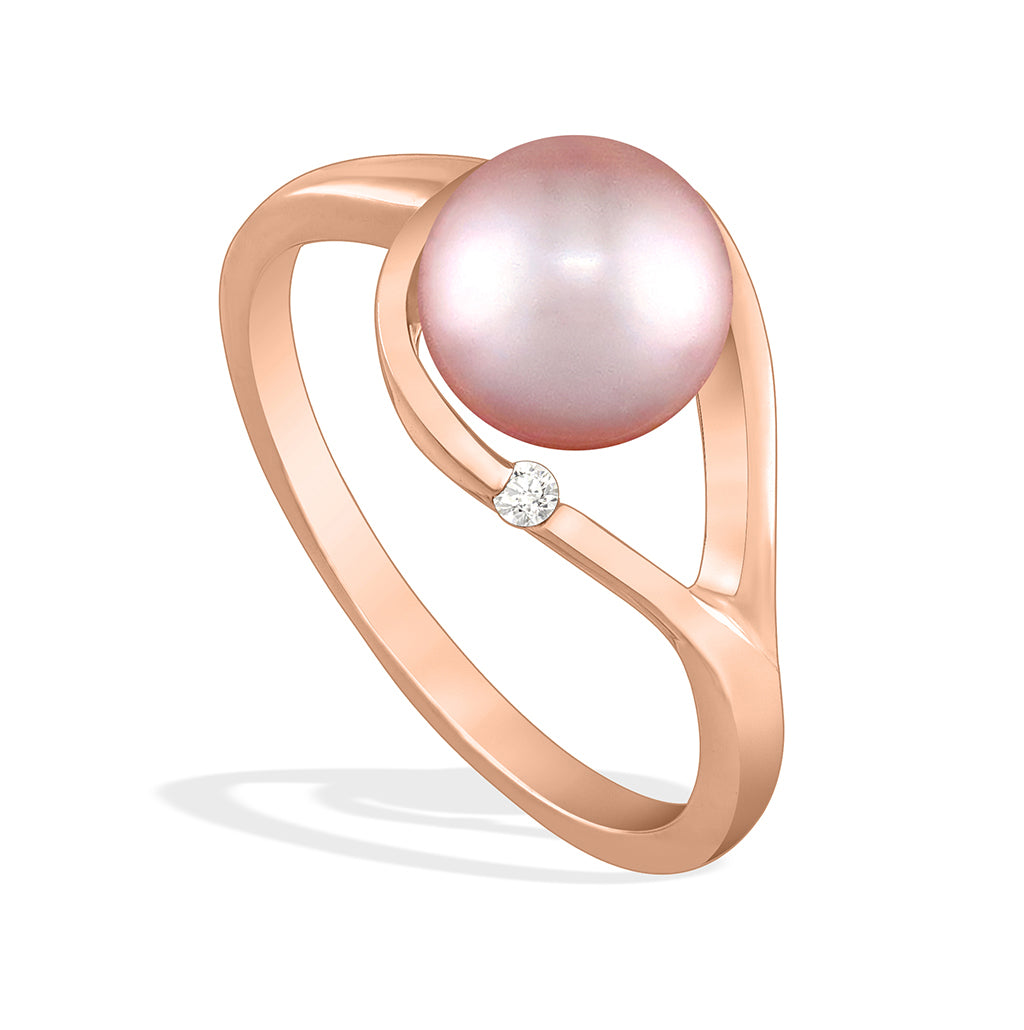 Raindrop ring featuring a 7mm natural pink freshwater pearl and a small diamond accent. 14K rose gold. Item No. 43870