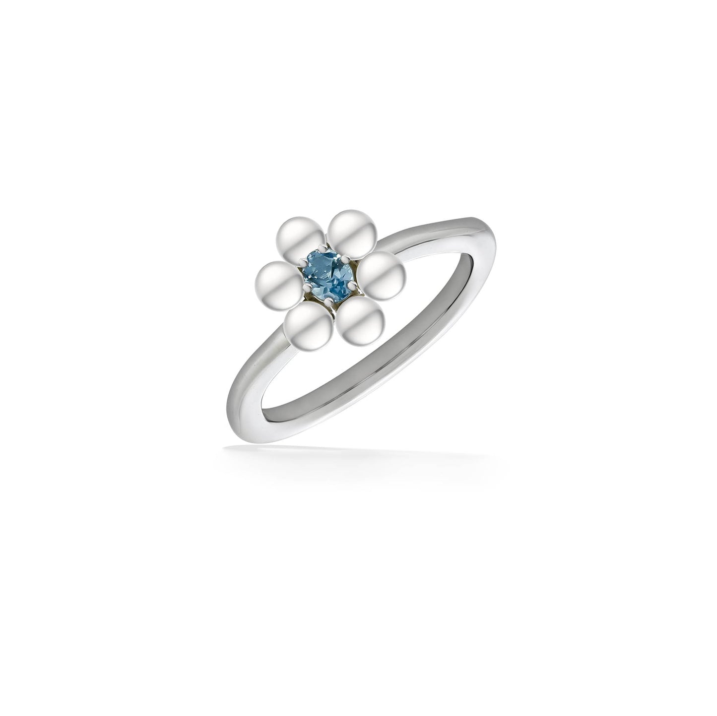 Flower ring with white freshwater pearls forming petals around a blue topaz gemstone on sterling silver band. Item No. 44496