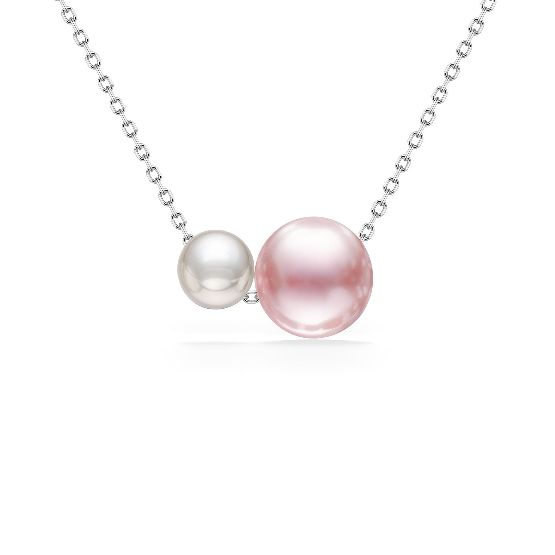 Necklace made with a white akoya pearl (5mm) & pink freshwater pearl (7.5mm) on a 14K white gold chain. Item No. 44695